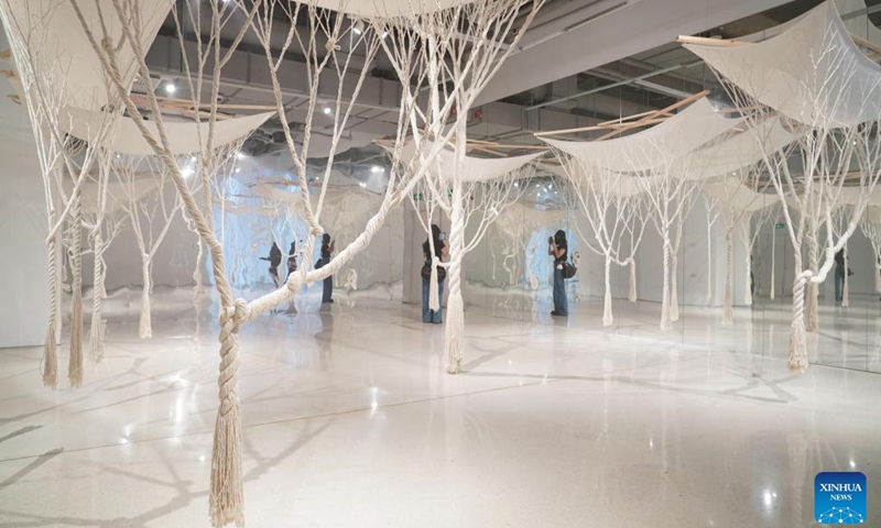 Tourists visit the contemporary art exhibition WAVELENGTH: A Momentary Spring at Beijing Times Art Museum in Beijing, capital of China, March 29, 2023. The event kicked off here on Wednesday, displaying contemporary art installations from 16 international artists. It will last until July 1.(Photo: Xinhua)