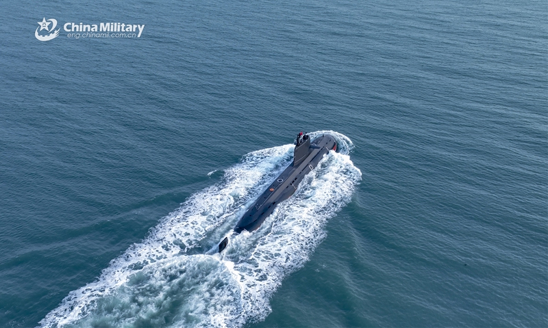 A submarine attached to a naval submarine flotilla under the PLA Northern Theater Command steams in the sea during a training exercise on March 21, 2023. (eng.chinamil.com.cn/Photo by Wu Haodong)