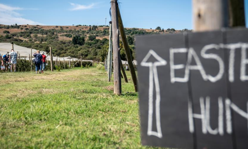 A sign for an Easter egg hunting event is seen at a farm in Johannesburg, South Africa, April 8, 2023. Various activities were held in Johannesburg to mark the upcoming Easter. (Photo by Shiraaz Mohamed/Xinhua)