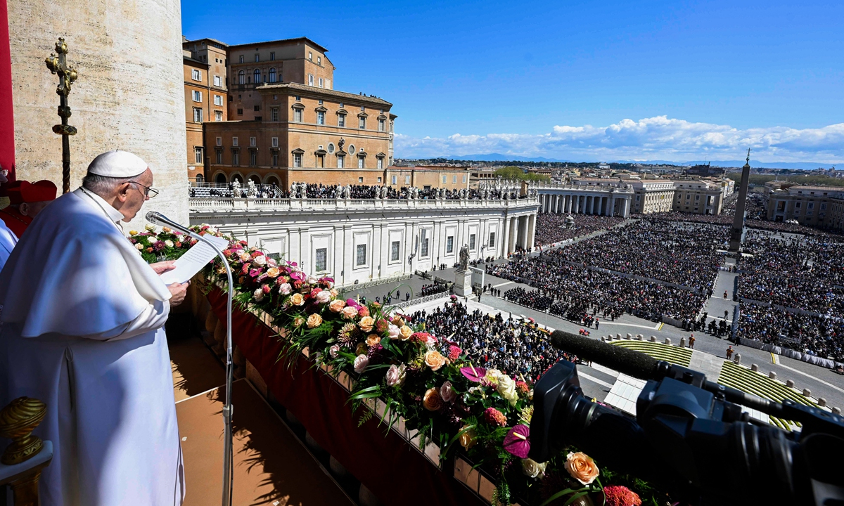 Pope Francis addresses attendees prior to delivering the Easter message and blessings on April 9, 2023 in Vatican. The Pople called on Israelis and Palestinians wracked by the latest surge in deadly violence to forge a 