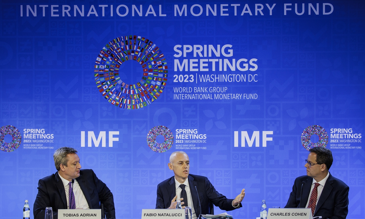 International Monetary Fund (IMF) officials speak at a press conference in Washington, DC on April 11, 2023 US time. The IMF trimmed its global growth projections, warning of high uncertainty and risks as financial sector stress adds to pressures emanating from tighter monetary policy. Yet the organization predicted Chinese economy to grow 5.2 percent in 2023, being a key contributor to global growth. Photo: VCG