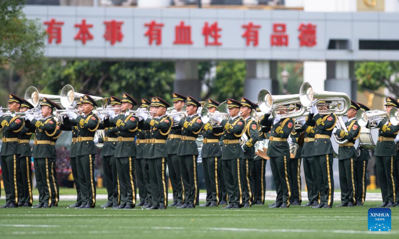 The military band of the Chinese People's Liberation Army Garrison stationed in the Macao Special Administrative Region perform during an open day event at the barracks on Taipa Island in Macao, south China, April 30, 2023. This was the 17th time that the barracks had been opened to the public since 2005, helping with communication between the garrison and local residents. (Xinhua/Cheong Kam Ka)