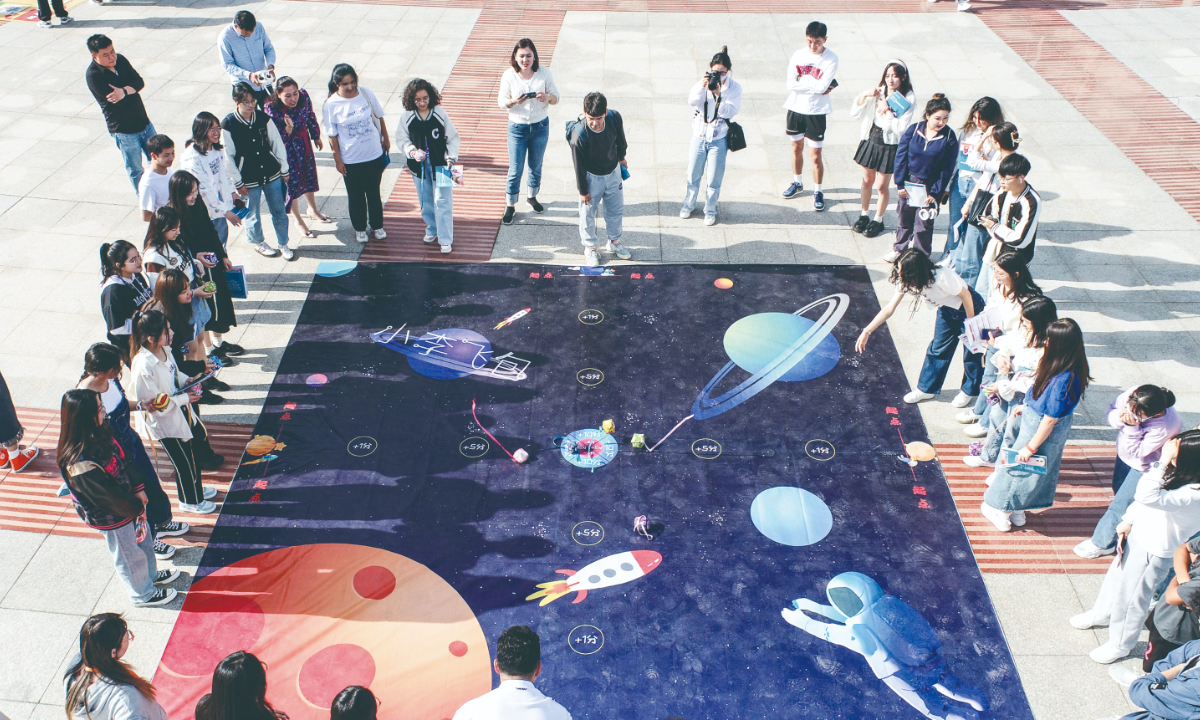 College students play a career planning game in Huai’an, East China’s Jiangsu Province to explore the career world and make plans for the future on May 9, 2023. Photo: IC