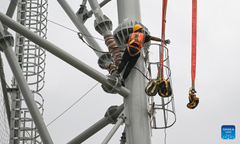 A worker performs tasks at a construction site of the Hainan commercial spacecraft launch site in Wenchang City, south China's Hainan Province, May 13, 2023. (Xinhua/Pu Xiaoxu)