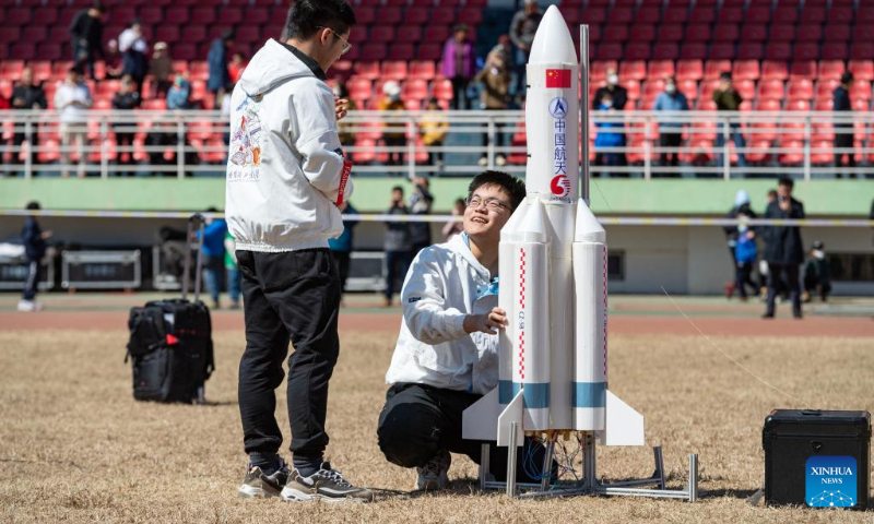 Students from the aviation model association of Harbin Institute of Technology prepares to launch a rocket on campus in Harbin, capital of northeast China's Heilongjiang Province, on April 22, 2023. Activities are held in Harbin Institute of Technology to celebrate the upcoming Space Day of China, which falls on April 24. (Xinhua/Xie Jianfei)