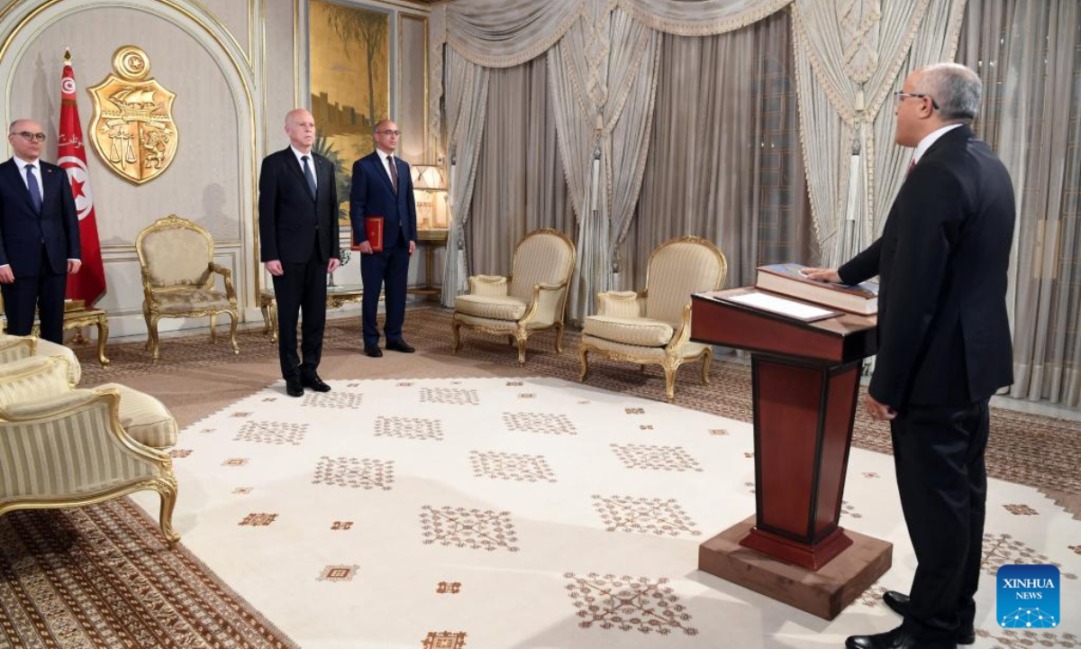 Mohamed Mhadhbi (R) is sworn in as Tunisia's new ambassador to Syria in Tunis, Tunisia, on April 27, 2023. Tunisian President Kais Saied has appointed Mohamed Mhadhbi as the country's new ambassador to Syria, according to a statement released by the presidency on Thursday. Photo:Xinhua