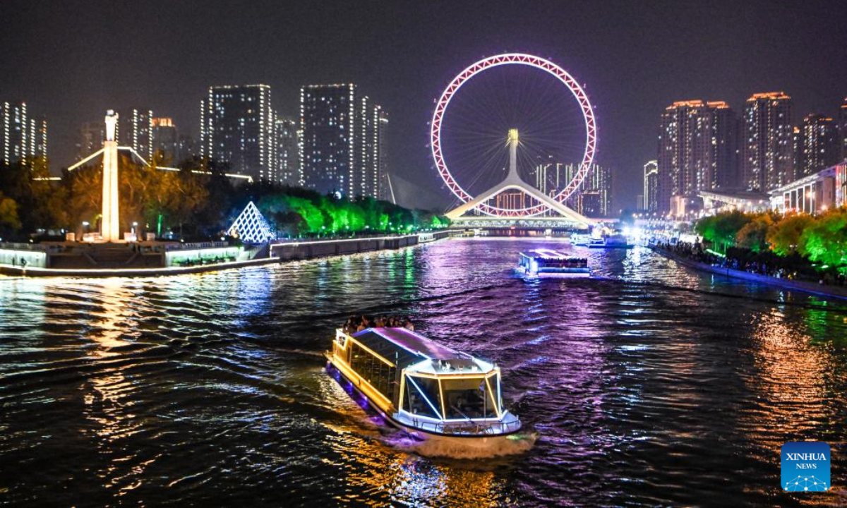 This photo taken on April 27, 2023 shows the night view of the Tientsin Eye Ferris wheel in north China's Tianjin. The Tientsin Eye Ferris wheel, also known as the Tianjin Eye, one of the city's landmarks, has been renovated for the upcoming Labor Day holiday. Photo:Xinhua