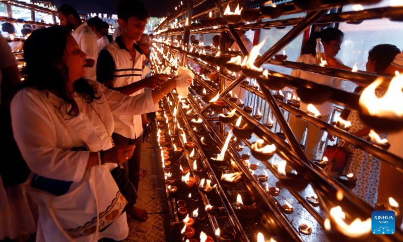 Buddhists are seen in a temple in the outskirts of Colombo, Sri Lanka, May 5, 2023. Sri Lanka celebrated Vesak Day on Friday. (Photo by Ajith Perera/Xinhua)