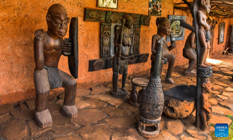 Photos taken on April 13, 2023 shows carved wooden statuettes exhibited in the palace of Batoufam chiefdom, West region, Cameroon. (Xinhua/Kepseu)