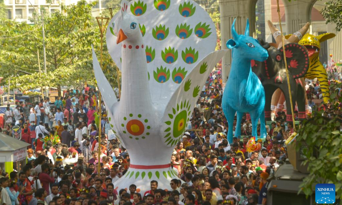 People join a colorful procession to celebrate the Bengali New Year in Dhaka, Bangladesh on April 14, 2023. Photo:Xinhua