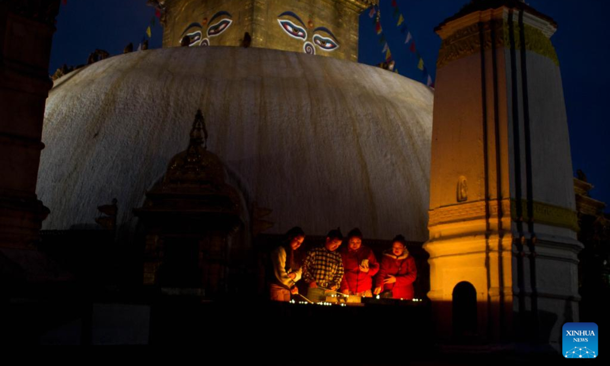 Devotees light oil lamps to mark Buddha Jayanti, the birth anniversary of Lord Buddha, at the Swayambhunath Stupa in Kathmandu, Nepal, May 5, 2023. Every year, Buddha Jayanti is celebrated on the full moon day in the Nepali month of Baishakh marking Buddha's birth, attainment of enlightenment and his death. Photo:Xinhua