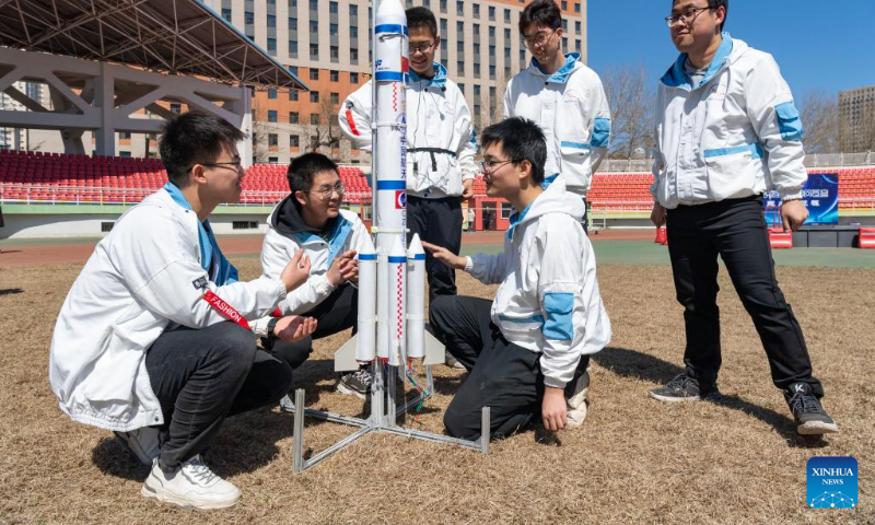 Students from the aviation model association of Harbin Institute of Technology prepares to launch a rocket on campus in Harbin, capital of northeast China's Heilongjiang Province, on April 22, 2023. Activities are held in Harbin Institute of Technology to celebrate the upcoming Space Day of China, which falls on April 24. (Xinhua/Xie Jianfei)