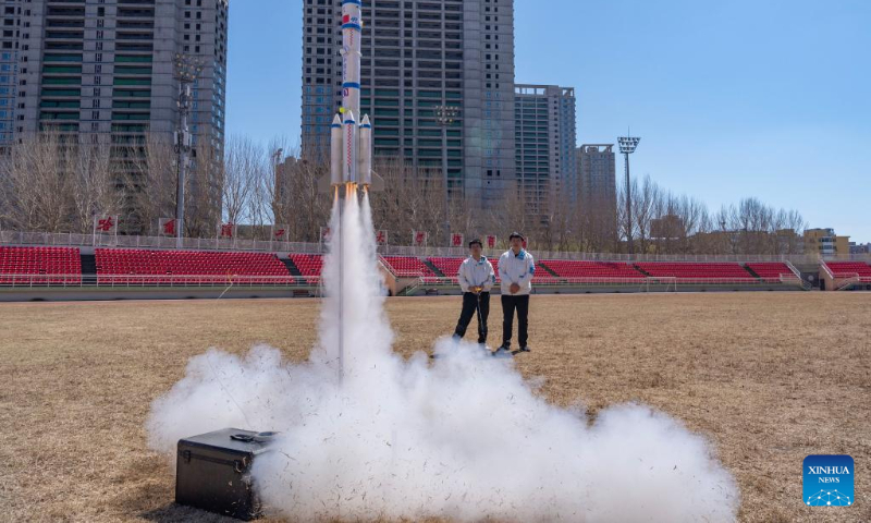 Students from the aviation model association of Harbin Institute of Technology launch a rocket on campus in Harbin, capital of northeast China's Heilongjiang Province, on April 22, 2023. Activities are held in Harbin Institute of Technology to celebrate the upcoming Space Day of China, which falls on April 24. (Xinhua/Xie Jianfei)