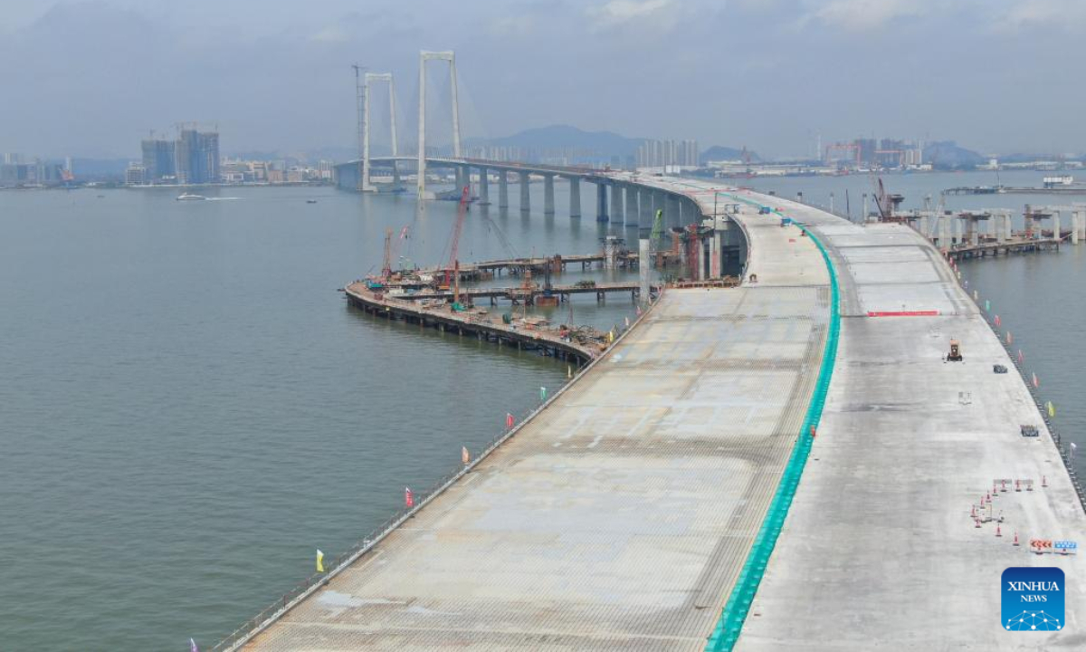 This aerial photo taken on April 28, 2023 shows the construction site of a bridge which constitutes the Shenzhen-Zhongshan link in south China's Guangdong Province. Lingdingyang bridge, a key part of the Shenzhen-Zhongshan link, got its final segments joined on Friday. Photo:Xinhua