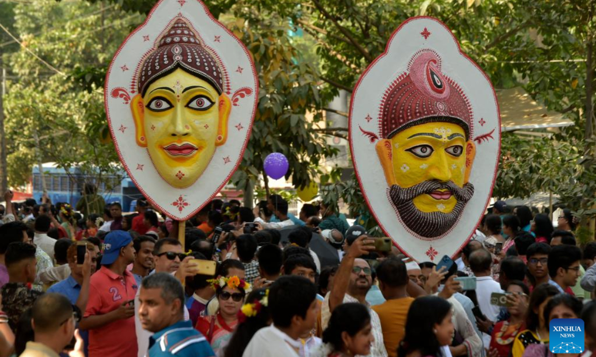 People join a colorful procession to celebrate the Bengali New Year in Dhaka, Bangladesh on April 14, 2023. Photo:Xinhua