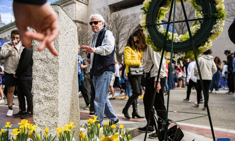 People mourn the victims of the Boston Marathon bombings in Boston, the United States, April 15, 2023. April 15, 2023 marks the 10-year anniversary of the Boston Marathon Bombings back in 2013.

On April 15, 2013, two bombs went off near the finish line of the Boston Marathon, killing three people and wounded more than 260 others. (Photo by Ziyu Julian Zhu/Xinhua)