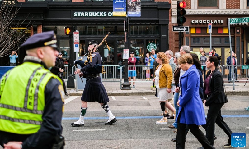 Family members of the Boston Marathon bombings victims walk towards the memorial site during a remembrance event in Boston, the United States, April 15, 2023. April 15, 2023 marks the 10-year anniversary of the Boston Marathon Bombings back in 2013.

On April 15, 2013, two bombs went off near the finish line of the Boston Marathon, killing three people and wounded more than 260 others. (Photo by Ziyu Julian Zhu/Xinhua)