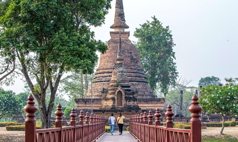 Tourists visit the Historic Town of Sukhothai in Sukhothai, Thailand, April 16, 2023. In 1991, the United Nations Educational, Scientific and Cultural Organization (UNESCO) has inscribed the Historic Town of Sukhothai and Associated Historic Towns on its World Heritage List(Photo: Xinhua)