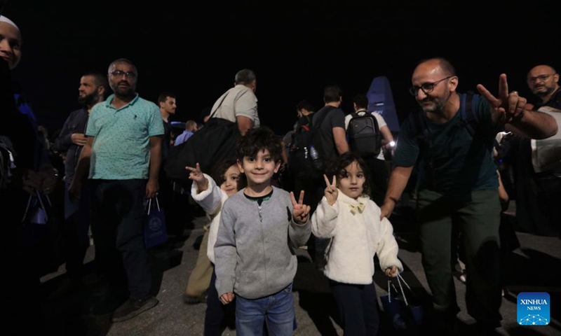 People evacuated from Sudan arrive at Marka Military Airport in Amman, Jordan, on April 24, 2023. Jordan evacuated 343 people from Sudan on Monday, the state-run Petra news agency reported. A total of 343 Jordanians, Palestinians, Iraqis, Syrians and Germans arrived in Jordan early Monday in four planes of the Royal Jordanian Air Forces, said the report.(Photo: Xinhua)