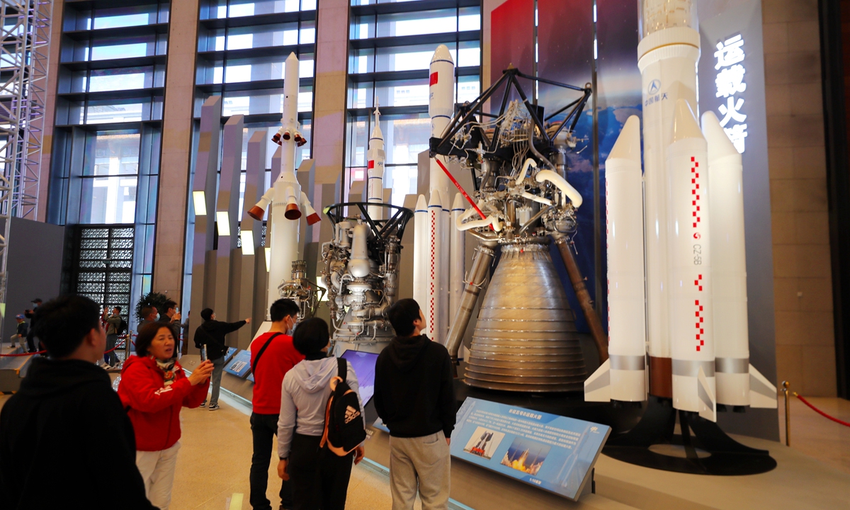 
Residents and tourists visit an exhibition of China's accomplishments of 30 years of manned space program in Beijing on April 26, 2023. Photo: VCG