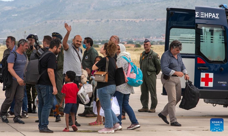 Evacuees from Sudan arrive at the military airfield of Elefsina near Athens, Greece, on April 25, 2023. Greece has evacuated over 50 of its citizens and their family members from the Sudanese capital Khartoum amid military clashes, Greek Foreign Affairs Minister Nikos Dendias said on Tuesday.(Photo: Xinhua)