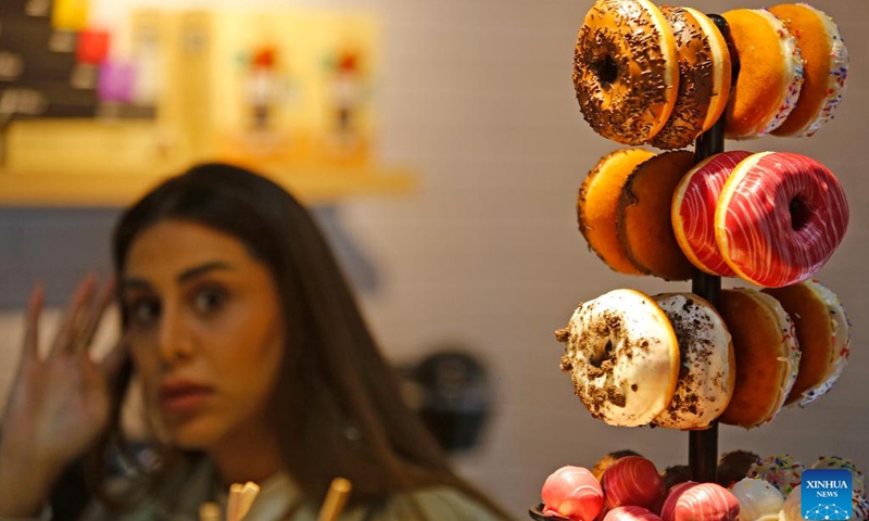 An exhibitor displays products at the HORECA Lebanon in Beirut, Lebanon, on April 25, 2023. About 160 Lebanese and international exhibitors attended the HORECA Lebanon, an annual trade fair for the hospitality industry, which kicked off here on Tuesday.(Photo: Xinhua)