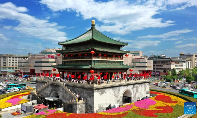 This aerial photo taken on May 1, 2023 shows a view of the Bell Tower in Xi'an, northwest China's Shaanxi Province. Xi'an, a city with over 3,100 years of history, served as the capital for 13 dynasties in Chinese history. It is also home to the world-renowned Terracotta warriors created in the Qin Dynasty (221-207 BC).(Photo: Xinhua)