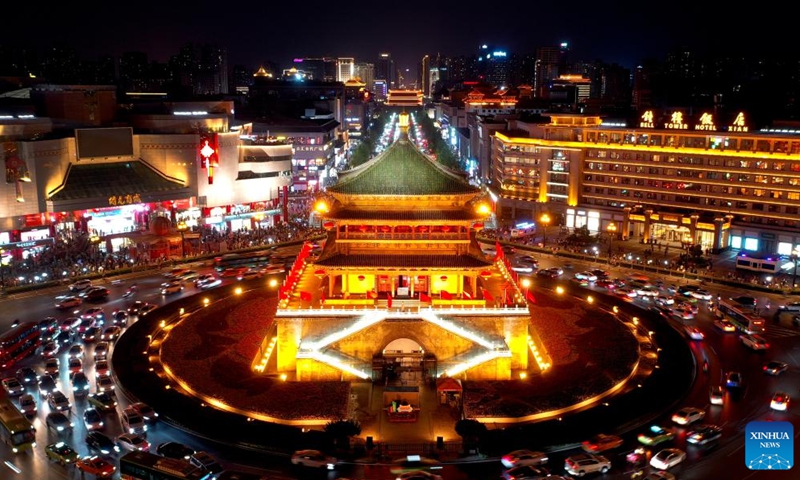 This aerial photo taken on May 2, 2023 shows a night view of the Bell Tower in Xi'an, northwest China's Shaanxi Province. Xi'an, a city with over 3,100 years of history, served as the capital for 13 dynasties in Chinese history. It is also home to the world-renowned Terracotta warriors created in the Qin Dynasty (221-207 BC).(Photo: Xinhua)