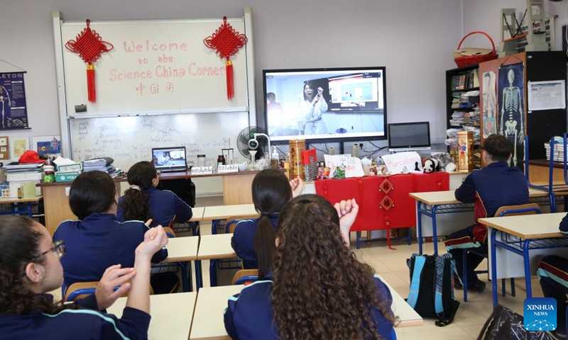 Students attend an online class on the benefits of Chinese acupressure techniques at St. Margaret College Secondary School in Cospiqua, Malta, on May 16, 2023. The online class on traditional Chinese medicine (TCM) was held with students at the China Corner at St. Margaret College Secondary School on Tuesday.(Photo: Xinhua)