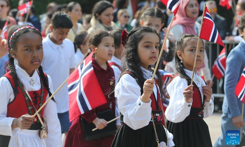 People parade to celebrate the Norwegian Constitution Day in Oslo, capital of Norway, on May 17, 2023.(Photo: Xinhua)