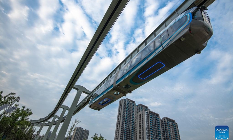 This photo taken on May 9, 2023 shows a train running on the suspension monorail line in Wuhan, central China's Hubei Province. The suspension monorail line in Wuhan has undergone a running test before being put into trial operation.(Photo: Xinhua)