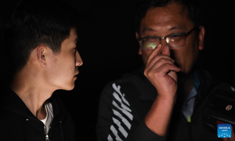 Investigators converse as they conduct a survey at a Chinese alligator national nature reserve in east China's Anhui Province, May 9, 2023. The Yangtze alligator, which has lived on Earth for over 200 million years, is a first-class protected animal endemic to China. Photo: Xinhua