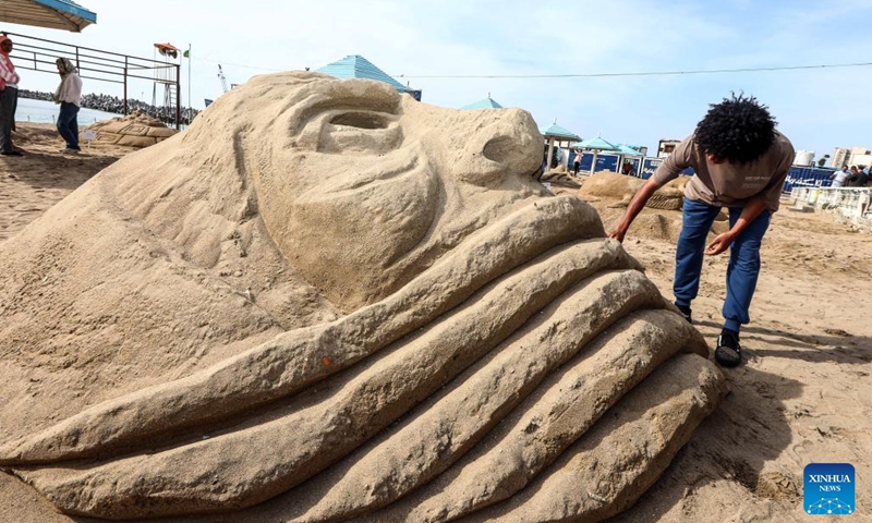 An artist works on a sand sculpture during a sand sculpture festival in Alexandria, Egypt, on May 10, 2023. The four-day Alexandria Sand Sculpture Festival, the first of its kind held by Alexandria governorate to promote tourism and encourage young talents, concluded on Wednesday evening.(Photo: Xinhua)