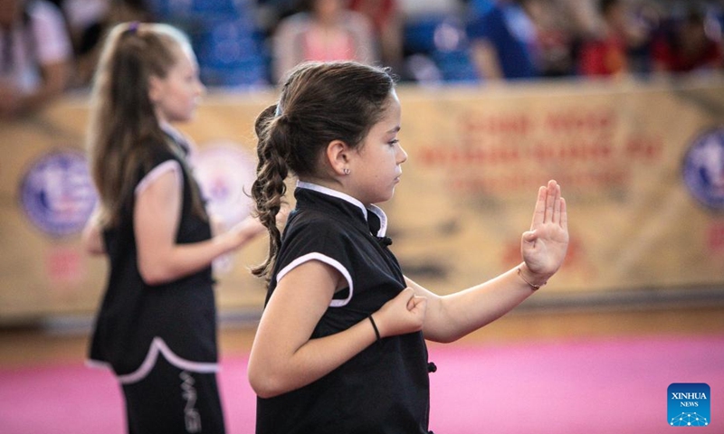 Young Kung Fu practitioners perform during the 1st European Chin Woo Wushu Kung Fu Open Championship and Chinese Cultural Festival in Athens, Greece on May 27, 2023.

The event kicked off on Saturday in Athens, offering a taste of Chinese culture to local audiences. (Photo by Panagiotis Moschandreou/Xinhua)