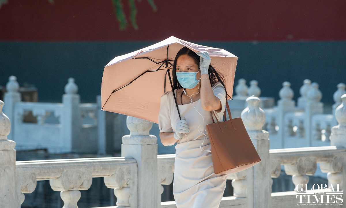 Heatwave sweeps across Beijing - Global Times