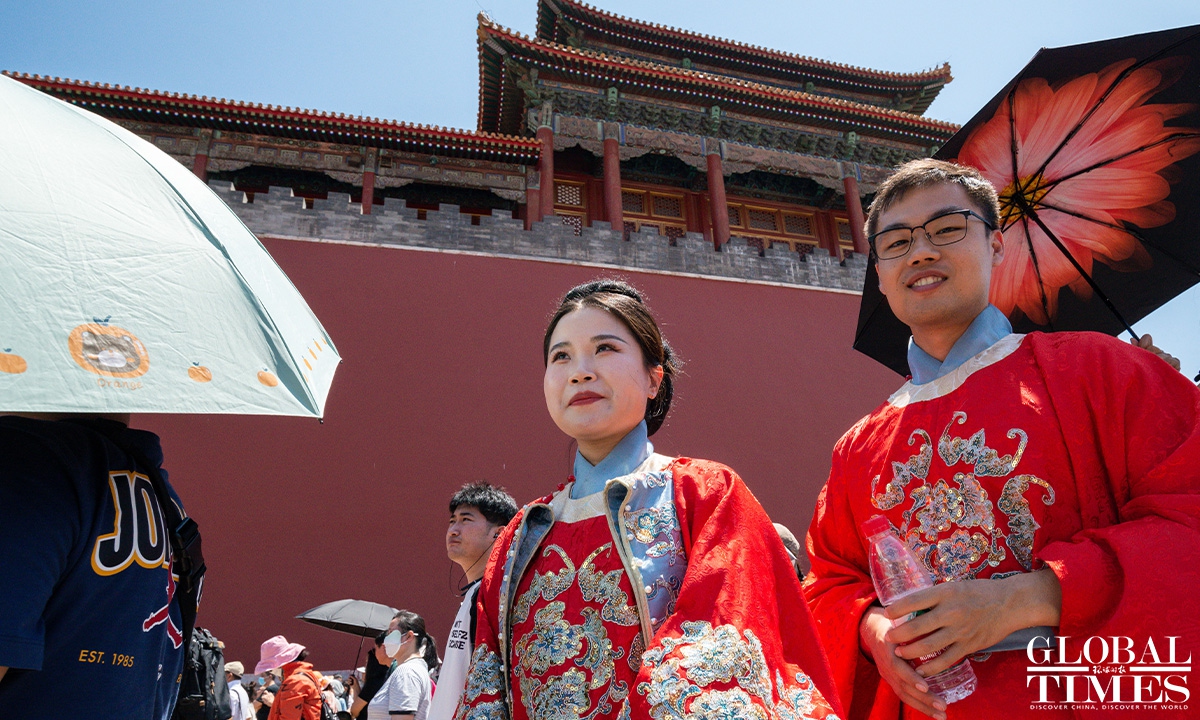 Heatwave sweeps across Beijing - Global Times