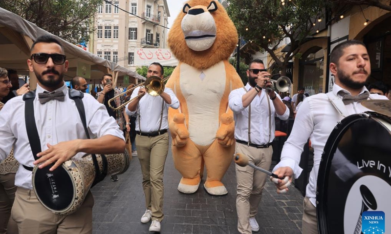 A band parades at a street fair in Beirut, Lebanon, on May 21, 2023.(Photo: Xinhua)