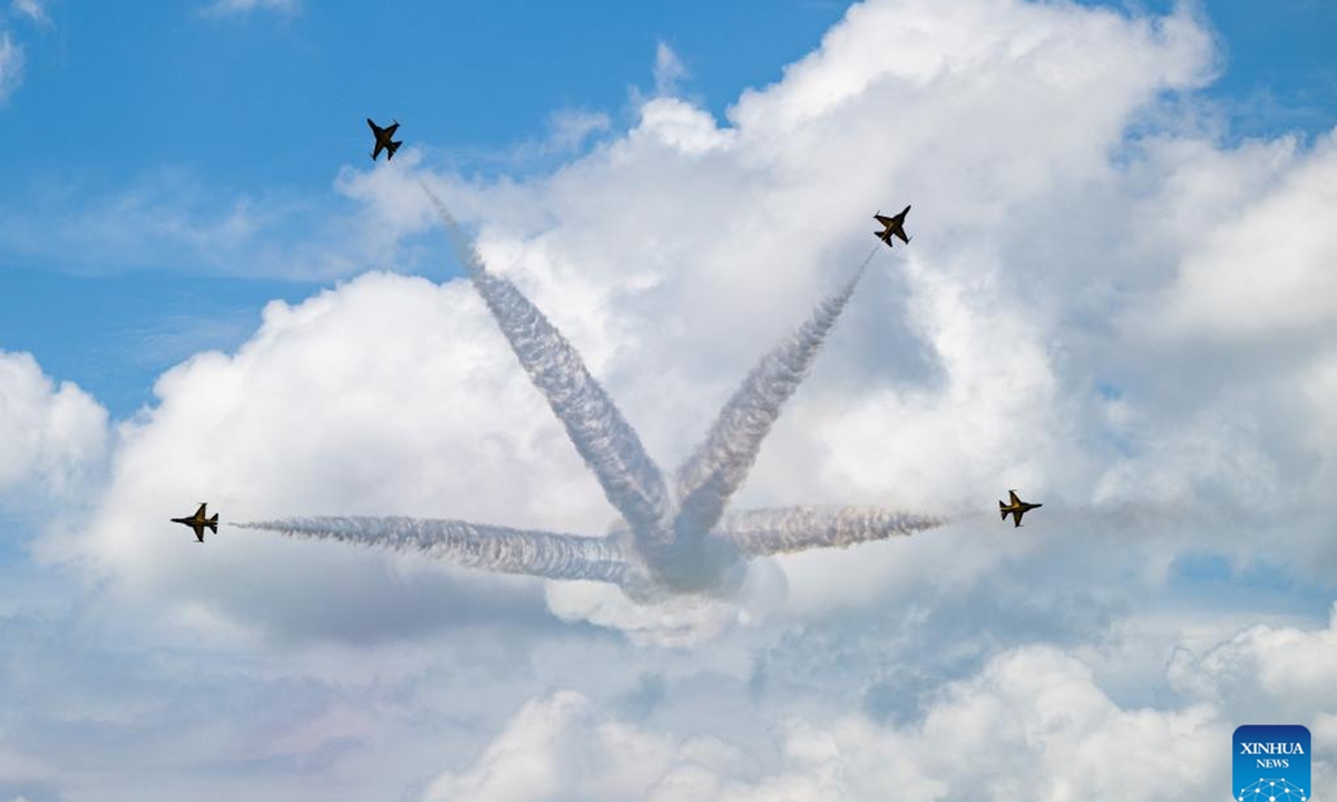 An aerobatic team performs during the air show at the 16th Edition of Langkawi International Maritime and Aerospace Exhibition (LIMA 2023) in Langkawi, Malaysia, May 23, 2023. (Xinhua/Zhu Wei)





