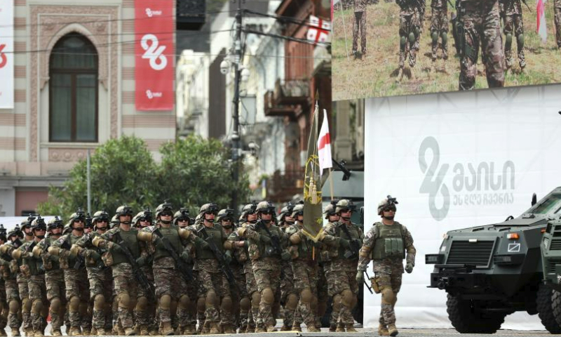 Georgian military personnel participate in a parade to celebrate the Independence Day at the Freedom Square in Tbilisi, capital of Georgia, on May 26, 2023. (Photo by Tamuna Kulumbegashvili/Xinhua)