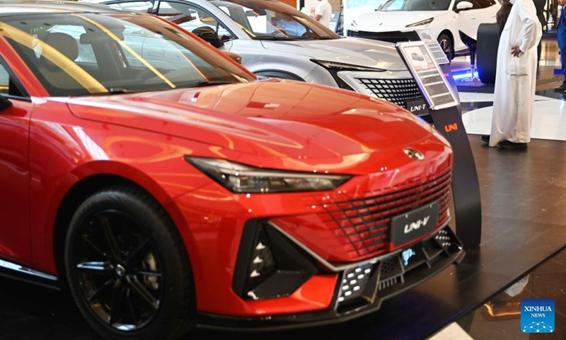 People visit a Chinese automobile exhibition in Hawalli Governorate, Kuwait, June 11, 2023. A Chinese-brand automobile exhibition opened in Hawalli Governorate on Sunday. Chinese automotive enterprises such as Dongfeng, Chang'an, Chery showed up with different vehicle models. The exhibition will continue until June 18. (Photo by Asad/Xinhua)