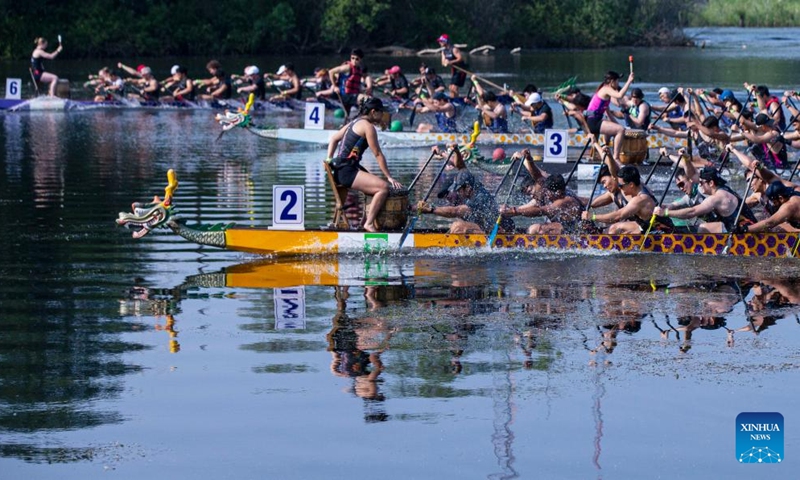 Participants compete during the 2023 Toronto International Dragon Boat Race Festival in Toronto, Canada, on June 17, 2023. This annual two-day event kicked off here on Saturday with hundreds of participants from around the world participating. (Photo by Zou Zheng/Xinhua)