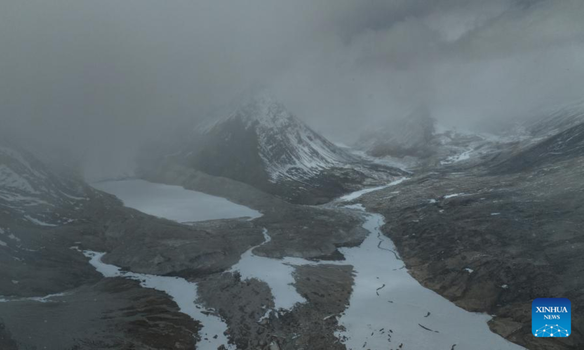 This aerial photo taken on May 31, 2023 shows the river bed at the foot of the Gyaimaryangzhong Glacier in southwest China's Tibet Autonomous Region. The Gyaimaryangzhong Glacier is the source of the Yarlung Zangbo River, China's longest plateau river. Photo:Xinhua