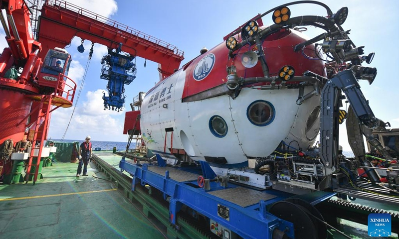 This photo taken on May 26, 2023 shows the crewed submersible Shenhai Yongshi (Deep Sea Warrior), which is used for collecting underwater archaeological data, aboard the scientific research ship Tansuo-1 in the South China Sea.(Photo: Xinhua)