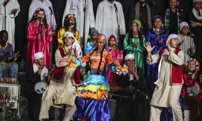 Artists perform at the closing ceremony of the International Festival for Drums and Traditional Arts in Cairo, Egypt, June 2, 2023. Themed Drums Dialogue for Peace, the 10th International Festival for Drums and Traditional Arts concluded here on Friday night. (Xinhua/Ahmed Gomaa)