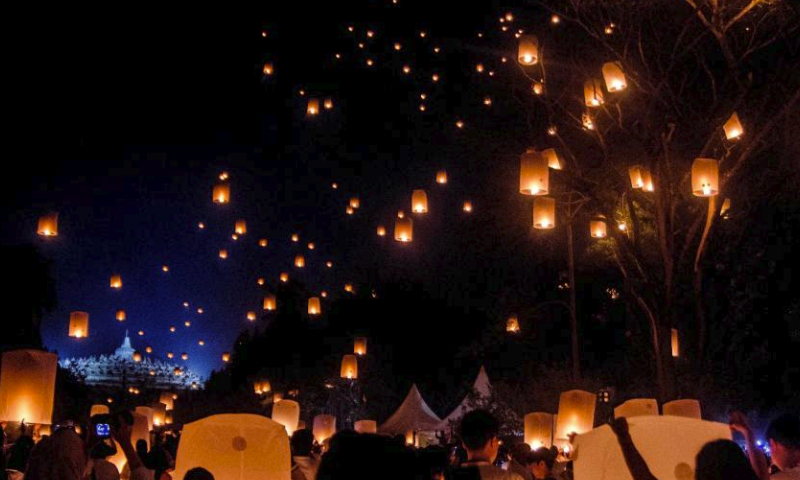 People release sky lanterns during the Vesak Day celebration at Borobudur temple in Magelang, Central Java, Indonesia, on June 4, 2023. (Photo by Agung Supriyantoo/Xinhua)