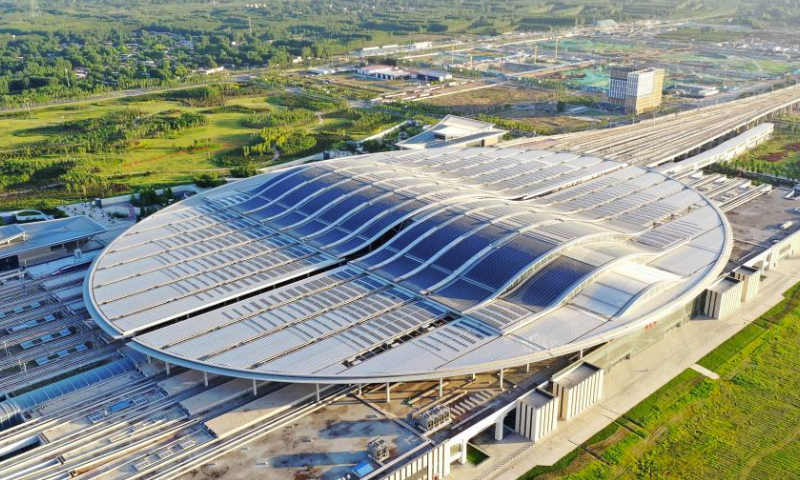 This aerial photo taken on June 2, 2023 shows the Xiong'an Railway Station in Xiong'an New Area, north China's Hebei Province. Located about 100 kilometers southwest of Beijing, the Xiong'an New Area has been designed as a major recipient of functions previously located in Beijing but which are not essential to its role as China's capital. Six years on, Xiong'an New Area, China's city of the future, is offering a glimpse of the Chinese vision of modernity. (Xinhua/Zhu Xudong)