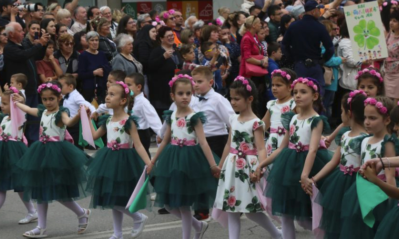 Children are pictured during the Rose Festival parade in Kazanlak, Bulgaria, June 4, 2023. A parade took place here on Sunday during the 2023 Rose Festival. Kazanlak is known for its Rose Festival, which has been organized since 1903. (Xinhua/Lin Hao)

