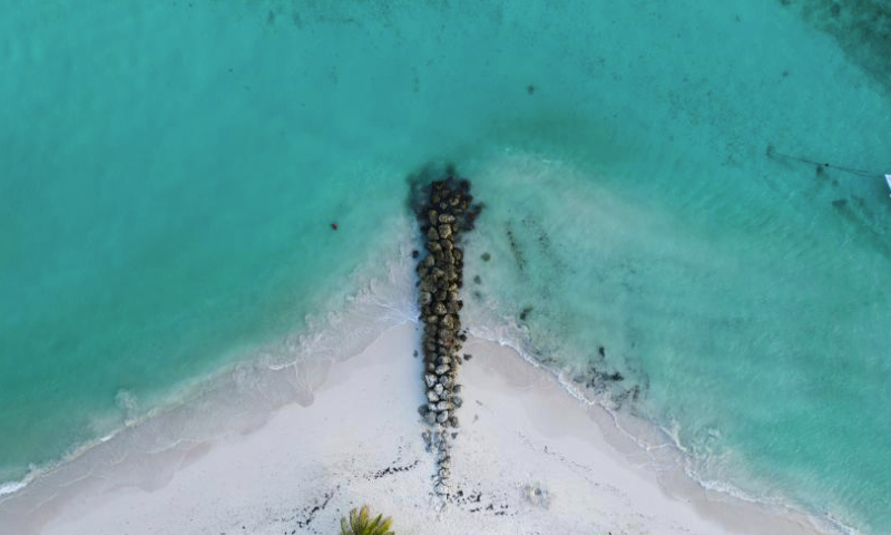 This aerial photo taken on May 29, 2023 shows a coastal view of Bridgetown, capital of Barbados. (Xinhua/Xin Yuewei)