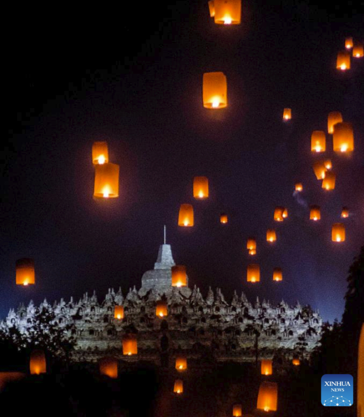 Sky lanterns are pictured during the Vesak Day celebration at Borobudur temple in Magelang, Central Java, Indonesia, on June 4, 2023. (Photo by Agung Supriyantoo/Xinhua)