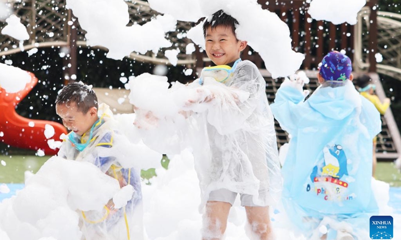 Children have fun during a bubble party at a kindergarten in Nanjing, east China's Jiangsu Province, May 31, 2023. June 1 marks the International Children's Day. Various events were held nationwide with vibrant colors and joyful laughter as children and families gathered for celebration.(Photo: Xinhua)